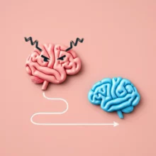 A-3D-illustration-showing-a-path-from-a-stressed-brain-icon-to-a-calm-brain-icon.