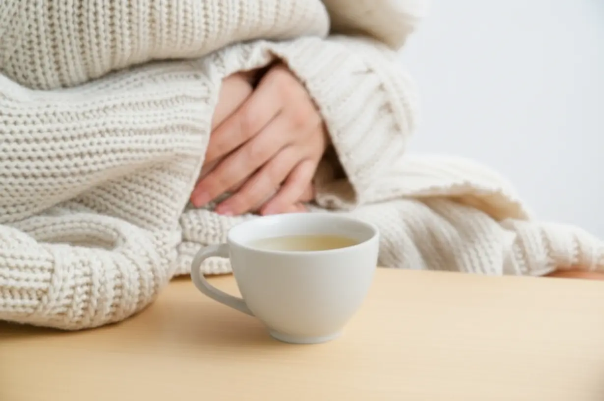 따뜻한-담요가-위를-감싸고-허브차가-놓여있는-아늑한-3D-이미지